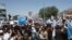Supporters of Afghan presidential candidate Abdullah Abdullah demonstrate in Kabul on June 21.