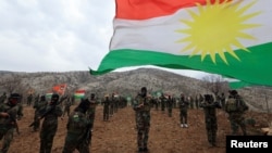 Borci iranskih Kurda iz Partije slobode Kurdistana na obuci u bazi na periferiji Erbila, u iračkom Kurdistanu, 12. februar 2026.