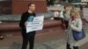 Damir Mukhammadayev (left) has taken part in rallies to protest Crimea's annexation and persecution of Crimean Tatars by Russian authorities.