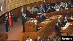 Chinese President Xi Jinping addresses a joint session of parliament in Islamabad on April 21.