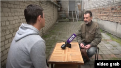 ვოლოდიმირ მიკოლაენკო ინტერვიუს აძლევს რუს პროპაგანდისტს ოკუპირებულ ხერსონში.