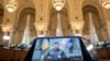 Ukrainian President Volodymyr Zelenskiy addresses the opening session of the Three Seas Initiative via video link at the Cotroceni Presidential Palace in Bucharest on September 6.