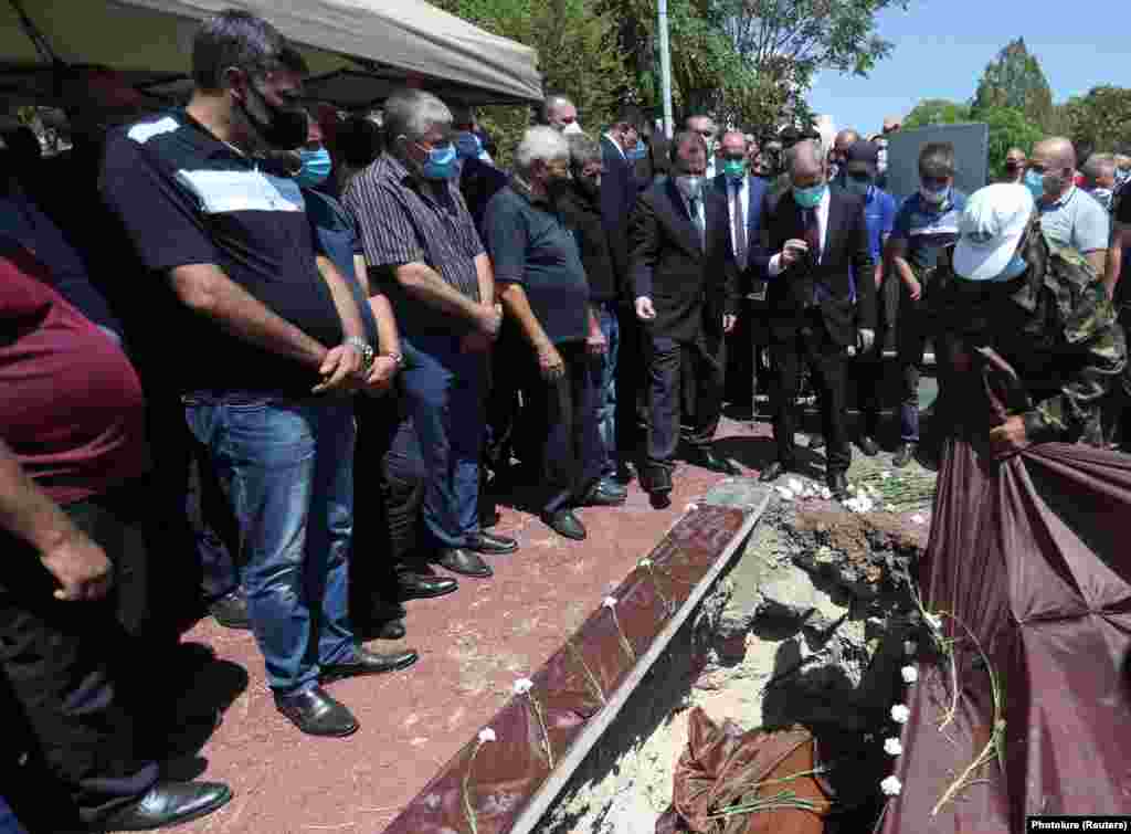 Armenian Prime Minister Nikol Pashinian attends the funeral of Major Garush Hambardzumian on July 16 in the Armenian capital, Yerevan. Hambardzumian is among at least four Armenian soldiers who have been killed in border clashes against Azerbaijani forces.