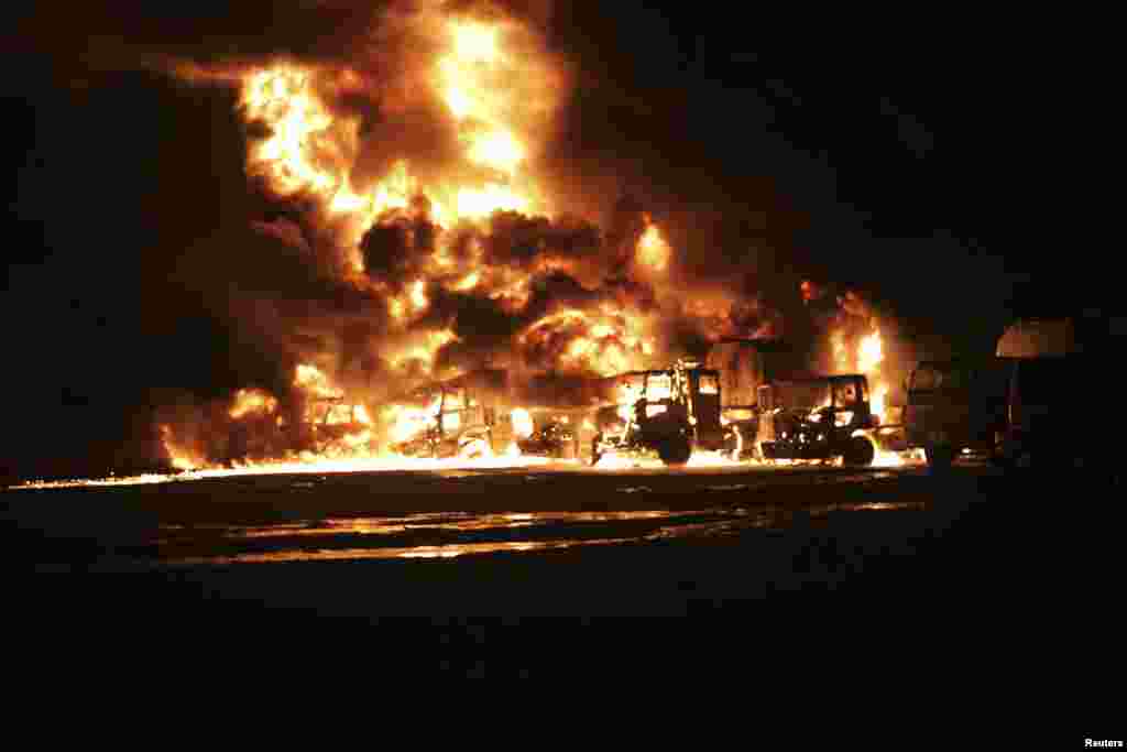 Tankers in flames late on September 15 after the apparent attack