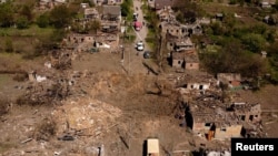 Разрушения в результате российского обстрела Бахмута, Донецкая область, 7 мая 2022 года