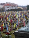 The Lychakiv Cemetery in Lviv is filled with Ukrainian flags and portraits of young soldiers.
