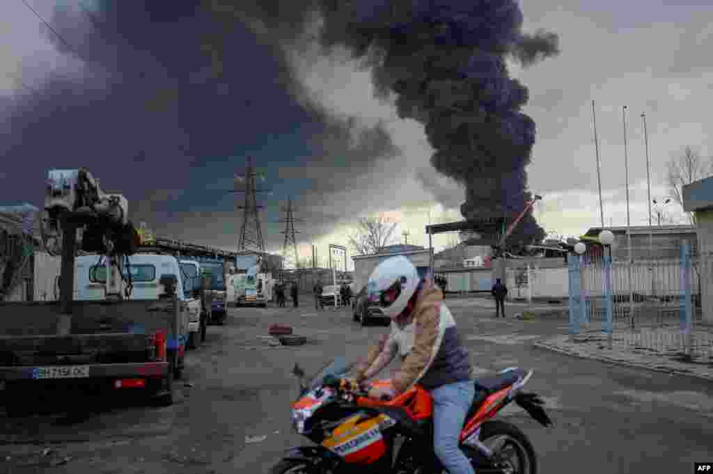 Smoke rises in the distance after a Russian attack on the Ukrainian port city of Odessa on April 3.