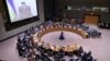 Ukrainian President Volodymyr Zelenskiy appears on a screen as he addresses the UN Security Council from Kyiv on April 5.