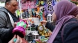PALESTINIAN-RELIGION-ISLAM-RAMADAN/Palestinians shop for traditional "fanous" lanterns, a decoration used to celebrate the start of the Muslim holy fasting month of Ramadan in the old city of Jerusalem on March 29, 2022.