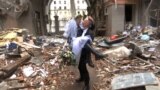 Kharkiv Medical Volunteers Marry Amid Ruins GRAB