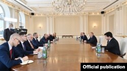 Президент Азербайджана Ильхам Алиев принимает действующего председателя ОБСЕ, главу МИД Польши Збигнева Рау, Баку, 31 марта 2022 г.