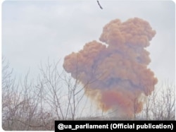 A toxic cloud of smoke rises above Rubizhne in Ukraine’s Luhansk region in this social media image released by Ukraine’s parliament on April 5.