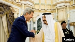 U.S. Secretary of State John Kerry (left) meets with Saudi Arabia's King Salman in Riyadh on May 7.