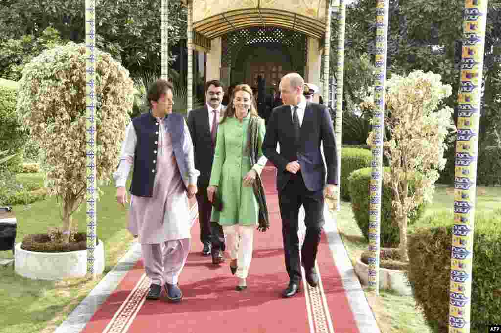 Pakistani Prime Minister Imran Khan (left) with Britain's Catherine, duchess of Cambridge, and Prince William, duke of Cambridge, in Islamabad on October 15.