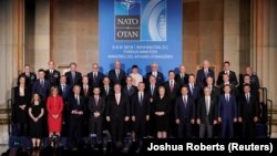NATO foreign ministers pose for a family photo at a reception to celebrate NATO's 70th anniversary in Washington on April 3.