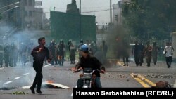 Iran -- Hassan Sarbakhsian’s Photos of Iranian Student Protests of July 1999, also known as 18th of Tir. In one the most widespread and violent public protests to occur in Iran since Iranian Revolution, at least 4 people have been killed and 200 injured. 