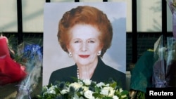 M. Thatcher