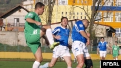 The imams, in green, took on a team of Catholic priests, in blue, in Tuzla's Tusanj stadium.