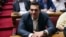 Greek Prime Minister Alexis Tsipras looks on during the Syriza party's parliamentary group meeting at the Greek parliament in Athens on July 15.