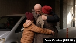 Зураб Джапаридзе с женой и ребенком