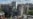 Firefighters work at a site of the apartment building damaged during a Russian missile and drone strike in Kyiv on May 14, 2026.