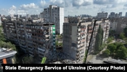 Ресей соққысынан кейін қираған Киевтегі көп қабатты тұрғын үй. 14 мамыр 2026 жыл.