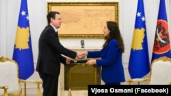 Aljbin Kurti i Vjosa Osmani