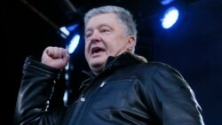 Former Ukrainian President and current lawmaker Petro Poroshenko speaks during a rally in central Kyiv on December 8, 2019.