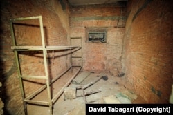 The inside of a cell believed to have held prisoners during the Soviet era.