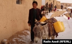 Ahmad Zia transports water to the Afghan security forces in Ghor Province in 2020.