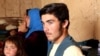 Ahmad Zia, 14, was the only money earner for his extended family of 30 people in Ghor Province. He lost his job as a water bearer for Afghan security forces when the Taliban seized power.  