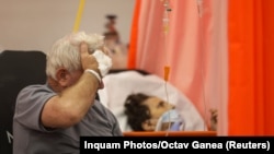 Inside Romania's Hospitals As COVID Crisis Intensifies