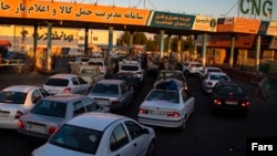 There were long lines at gas stations across Iran on October 26 after a government system managing fuel subsidies was badly disrupted by what state television said was a cyberattack. 