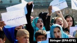 Afghan women protest against the Taliban's restrictions on their rights in Kabul on October 21.