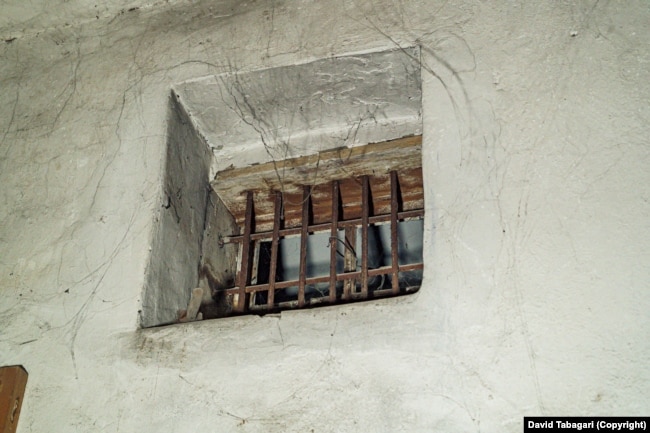 A barred window in the underground prison.