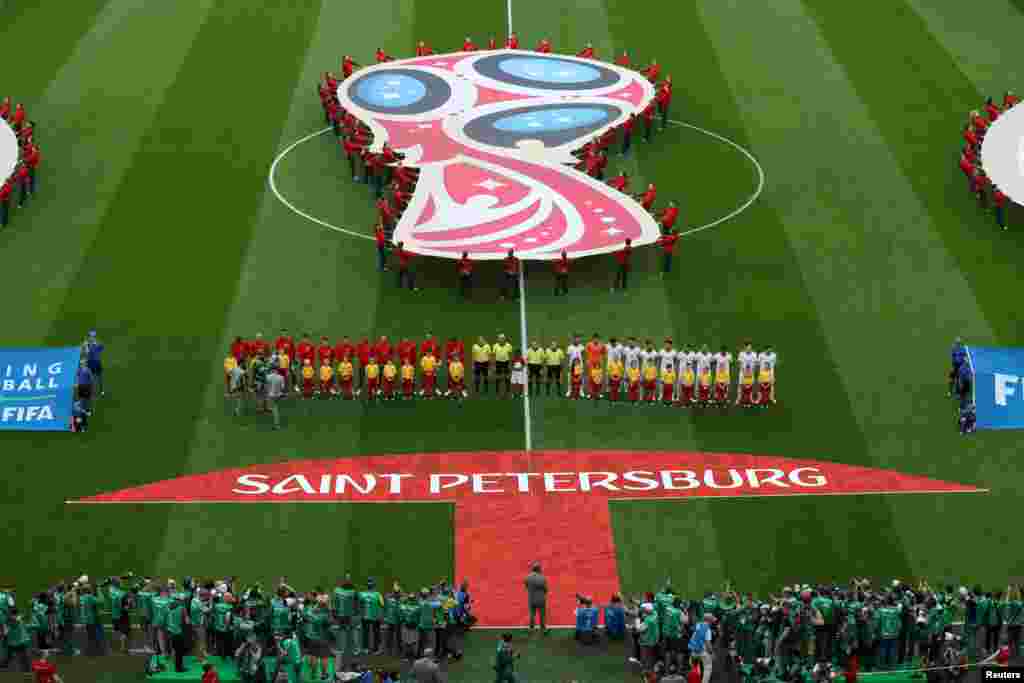 Soccer Football - World Cup - Group B - Morocco vs Iran - Saint Petersburg Stadium, Saint Petersburg, Russia - June 15, 2018 Players line up before the match REUTERS/Lee Smith