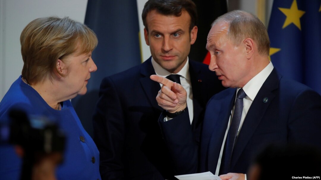 Almaniya kansleri Angela Merkel (solda) Fransa və Rusiya prezidentləri Emmanuel Makron və Vladimir Putin 2019-cu ildə