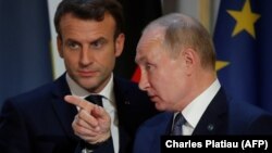 Francuski predsednik Emanuel Makron (Emmanuel Macron) i ruski predsednik Vladimir Putin u Parizu, decembar 2019.