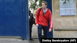 Russian opposition activist Aleksei Navalny leaves a detention center in Moscow on June 14.