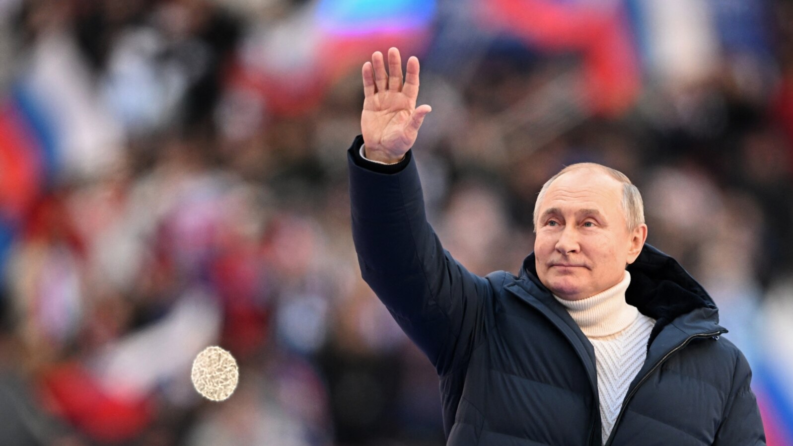 Președintele Rusiei, Vladimir Putin, la un eveniment de pe stadionul Lujniki din Moscova, cu ocazia marcării a 8 ani de când Rusia a ocupat Peninsula Crimeea, (18 martie 2022). 