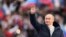 Președintele Rusiei, Vladimir Putin, la un eveniment de pe stadionul Lujniki din Moscova, cu ocazia marcării a 8 ani de când Rusia a ocupat Peninsula Crimeea, (18 martie 2022). 