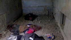 Cadavre cu gloanțe în cap și cu mâinile legate la spate au fost descoperite în subsolul unei tabere pentru copii din Ucraina.