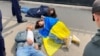 Police detain Oyan, Qazaqstan activists near the Russian Consulate in Almaty on April 9.