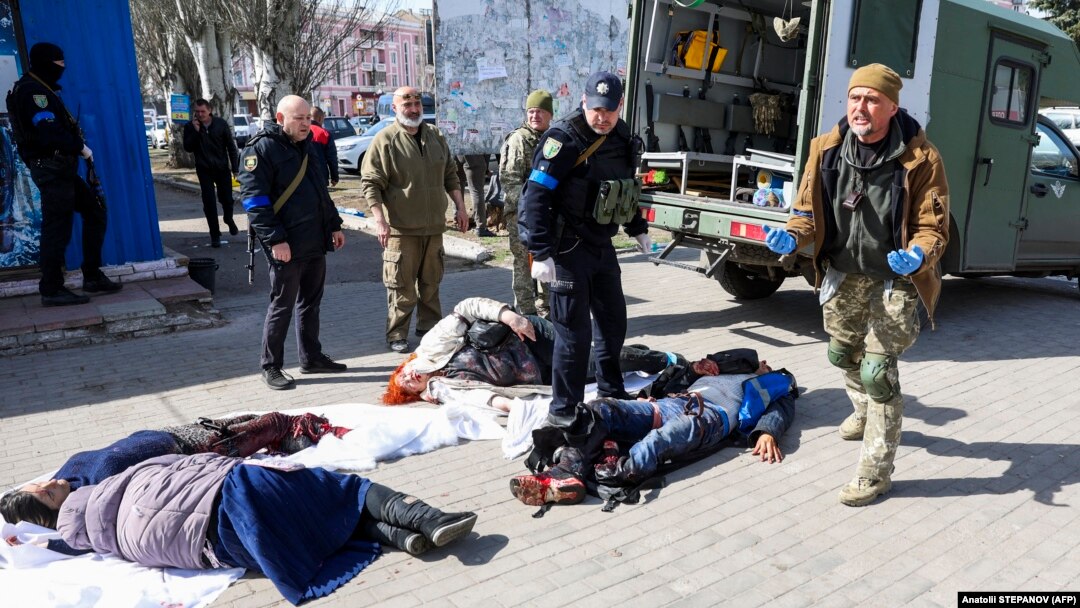 Rescue personnel tend to victims of a Russian attack on the railway station in the eastern city of Kramatorsk on April 8.