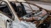 A destroyed civilian car in Nova Basan (file photo)