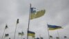  National flags wave over the graves of Ukrainian soldiers at a cemetery in Chernihiv on April 6.
