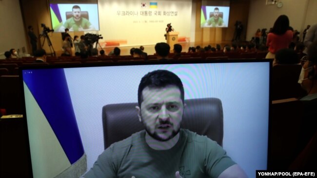 Ukrainian President Volodymyr Zelenskiy addresses the National Assembly in Seoul on April 11.