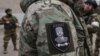Військові чеченського підрозділу СОБР «Ахмат», що підпорядковане Рамзану Кадирову та входить до складу російських збройних сил. Маріуполь, Україна, 4 квітня 2022 року