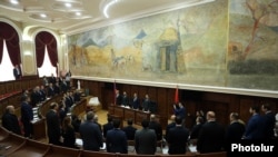 Armenia - Members of the Armenian government observe a minute of silence for victims of the 1988 earthquake at a meeting in Gyumri, December 7, 2018.