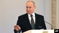 Russian President Vladimir Putin announced his intention to seek reelection at an award ceremony for veterans on December 8. 